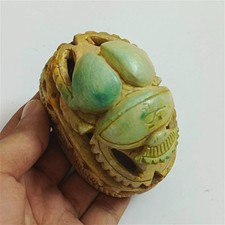 An Egyptian scarab carved in the Pharaonic style a collectible art piece. picture