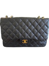 Chanel Maxi Classic Double Flap Bag – Black Lambskin and Gold Hardware picture