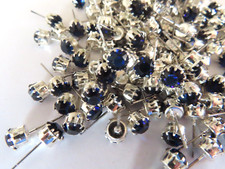 24 Swarovski Rhinestone 29ss Dk. Sapph/tiff. set sterling plate post earrings. picture