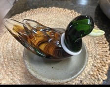 Hand blown art glass mallard duck figurine amber-and-brown body and a dark green picture