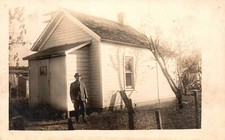 Man Standing Outside The House Black & White RPPC Photo Antique Postcard 1900's picture