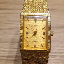 Seiko Quartz Gold Tone Rectangle Analog Dress Watch Textured Dial Bracelet picture