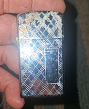 Zippo Slim Engine Turned Crosshatch Pattern Flip-Top Lighter picture