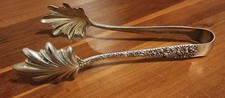 S. Kirk & Son sterling silver tongs - repousse - 6 1/2