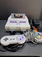 Super Nintendo Entertainment System SNES SNS-001 2 Controllers 1 Home Alone 2  picture
