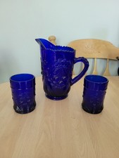 Vintage cobalt blue pitcher and 2 cups, cherry embossed picture