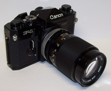 Canon F-1 35mm SLR Film Camera + Canon lens fd 135mm 1:3.5  Tested    EXUC picture