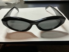 Prada PR 26ZS 16K08Z Women's Oval Sunglasses in Black with Gray Lens NEW picture