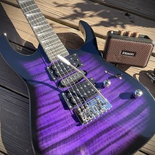 Full-Size Purple Electric Guitar and 5-Watt Amp Starter Package with Accessories picture