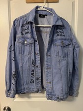 Official Selena Quintanilla graffiti-style denim jacket . picture