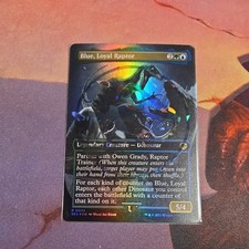 MTG Blue, Loyal Raptor Universes Beyond: Jurassic Park Emblem Foil NM picture