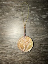 Chinese reddish-brown and green carved jade pendant picture