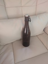 ANTIQUE-EARLY 1900S- BROWN-GLASS BOTTLE WITH WIRE, RUBBER SEAL, CERAMIC STOPPER picture