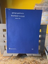 George Gershwin's RHAPSODY IN BLUE -  Piano Solo Sheet Music  Warner Bros. Music picture