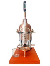 essential oils & hydrosol still alembic in copper with glass condensation coil picture