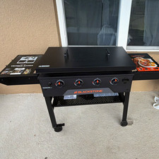 Blackstone 36in 4-Burner Propane Griddle w/ Hood Cart Wheels Black 2177 picture