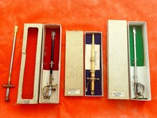 Collection of four, 4, Vintage Miniature Military Swords picture