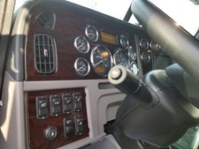 Peterbilt 389 2022-2026 Full Dash Trim Kit 8-pc Overlay Gloss Black Wood Carbon picture