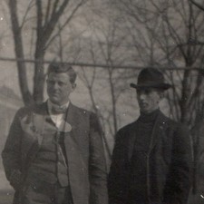 c1910s RPPC Two Men Walking Bow Tie Derby Hat Suit Park Sidewalk Solio Postcard picture