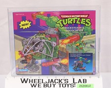 Rocksteady's Pogocopter AFA GRADED 80+ TMNT 1989 Playmates Vehicle NEW SEALED picture