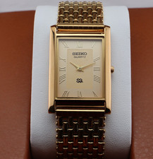 Vintage Seiko Slim Quartz Men's Wrist Watch Gold Dial with Gold Bracelet. picture