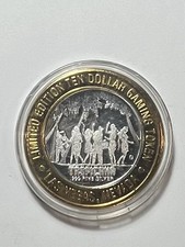 Ten Dollar Las Vegas Tropicana Blue Macaw silver Gaming Token picture