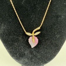 Christian Dior vintage featuring a signature pink leaf design. picture