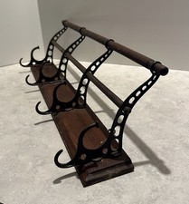 Antique Early 1900s Udells 4 Hook Hat & Coat Rack Oak Cast Iron Wall Mount  Nice picture