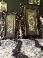 2 traditional Balinese paintings. beautifully detailed, hand-carved wooden frame picture