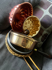 Antique Pots, Pans, Gelatin Molds, Wicker Holder picture