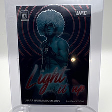 Panini 2023 Donruss Optic UFC Umar Nurmagomedov Light It Up Red Prizm #18 /99 picture