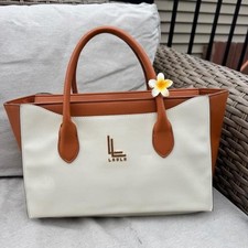 Loulu purse in great overall condition picture