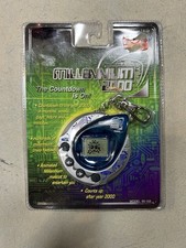 1998 Tiger Electronics Millennium 2000 Handheld Digital Mascot Game/Trivia NOS picture