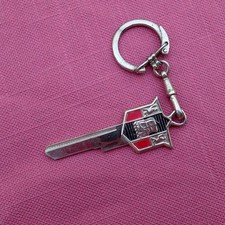 Vintage 1956-67 Plymouth Mayflower gold crest key blank and ring, uncut NOS picture
