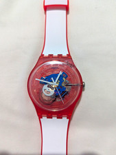 NEW. Swatch Multicolored Unisex Skeleton Quartz with Box and Papers picture