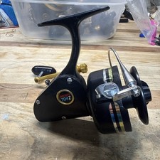 Vintage Penn Spinfisher 704Z Spinning Reel Black Gold Made USA Works Great picture