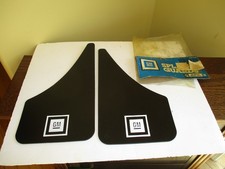 NOS 1970's-80's GM (GENERAL MOTORS) BLACK SET SPLASH GUARDS IN ORIGINAL PACKAGE picture