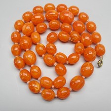 Vintage Lucite Necklace Orange Swirled Beads 32 Inch picture