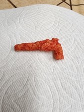 hot cheeto shape like a 44 Magnum handgun picture