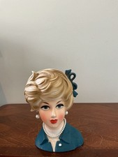 vintage Napcoware blonde lady head vase featuring a stylish blue jacket picture