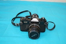 VINTAGE CANON EF 35mm  CAMARA WITH A CANON LENS FD 28mm, SERIAL NUMBER 349450 picture