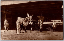 Vintage 1925 Postcard w/ Early Junkers Airplane in Hangar & Dromedary Camel picture