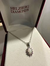 oval opal and diamond sunburst pendant in white gold from Helzberg Diamonds picture