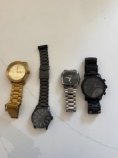 4 mens watches 3 Nixon watches 1 fossil watch working needs batteries picture