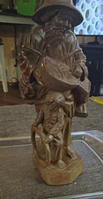 Vintage hand-carved wooden folk art figurine of a traveling man picture