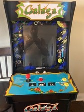 video game consoles. Pac-Man and Galaga With Arcade 1-up picture