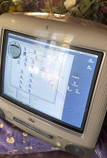 Functional Apple iMac G3 with keyboard, mouse and paperwork picture