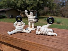 3 SMALL MICHELIN MAN CAST IRON FIGURINES TIRE ADVERTISING BIBENDUM GIVEAWAYS picture