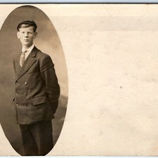 c1910s Young Man Newsboy Cap RPPC Oval Portrait Suit Fashion Antique Postcard picture