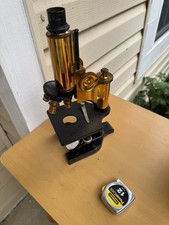 Antique microscope, exquisitely crafted and visually stunning. picture